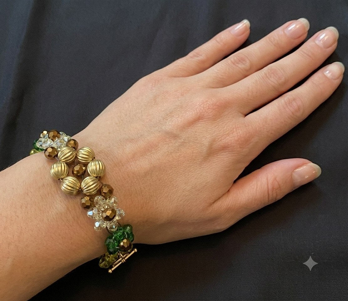 Model wearing Handcrafted Gold & Green Crystal Charm Bracelet – handmade Gold & Green bracelet by BeadMeRise